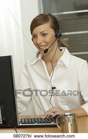 portrait of female call center agent wearing headset View Large Photo Image Stock Image - portrait of female call center agent wearing headset. Fotosearch