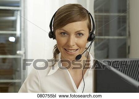 portrait of female call center agent wearing headset View Large Photo Image Stock Image - portrait of female call center agent wearing headset. Fotosearch