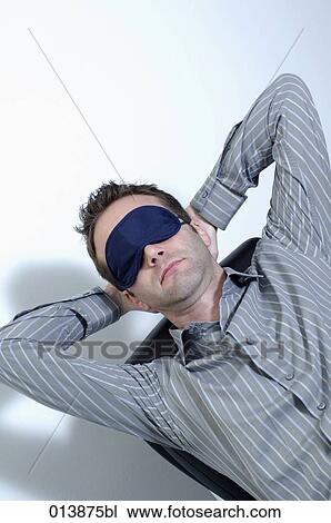 portrait of male executive dozing with sleep mask View Large Photo Image Stock Image - portrait of male executive dozing with sleep mask. Fotosearch