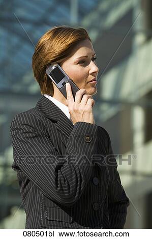 portrait of mature businesswoman talking on mobile phone View Large Photo Image Stock Image - portrait of mature businesswoman talking on mobile phone. Fotosearch