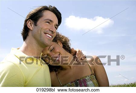 portrait of young couple embracing View Large Photo Image Stock Image - portrait of young couple embracing. Fotosearch