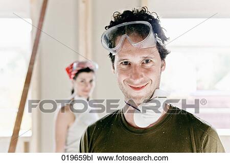 portrait of young man on construction site of new home View Large Photo Image Stock Image - portrait of young man on construction site of new home. Fotosearch
