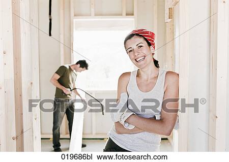 portrait of young woman on construction site View Large Photo Image Stock Image - portrait of young woman on construction site. Fotosearch