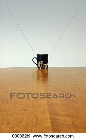 still life of black mug and sugar cubes on table View Large Photo Image Stock Image - still life of black mug and sugar cubes on table. Fotosearch