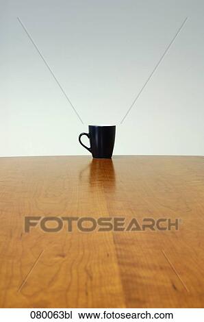 still life of black mug on table View Large Photo Image Stock Image - still life of black mug on table. Fotosearch