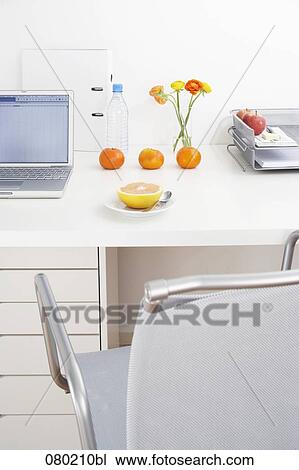 still life of different fruits on office desk View Large Photo Image Stock Image - still life of different fruits on office desk. Fotosearch