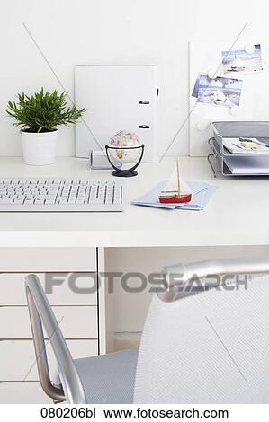 still life of little toy boat on empty office desk View Large Photo Image Stock Image - still life of little toy boat on empty office desk. Fotosearch
