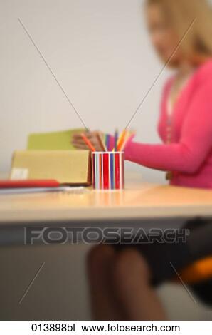 woman working at her office desk View Large Photo Image Stock Image - woman working at her office desk. Fotosearch