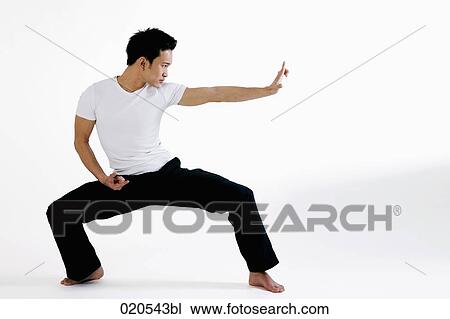 asian man doing martial arts exercises View Large Photo Image Stock Image - asian man doing martial arts exercises. Fotosearch