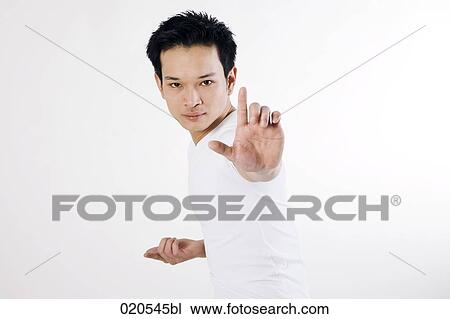 asian man doing martial arts exercises View Large Photo Image Stock Image - asian man doing martial arts exercises. Fotosearch