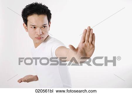 asian man doing martial arts exercises View Large Photo Image Stock Image - asian man doing martial arts exercises. Fotosearch