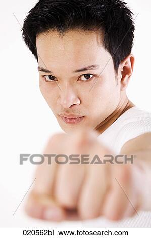 asian man doing martial arts exercises View Large Photo Image Stock Image - asian man doing martial arts exercises. Fotosearch