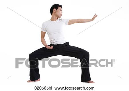 asian man doing martial arts exercises View Large Photo Image Stock Image - asian man doing martial arts exercises. Fotosearch