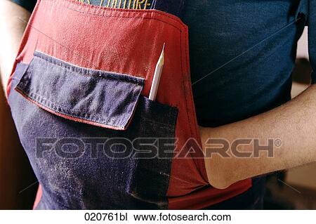 close-up of craftsman wearing dungarees View Large Photo Image Stock Image - close-up of craftsman wearing dungarees. Fotosearch