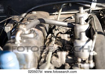 Stock Image - close-up of engine of classic car. Fotosearch