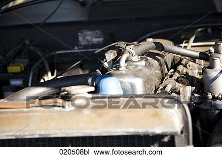 close-up of engine of classic car View Large Photo Image Stock Image - close-up of engine of classic car. Fotosearch