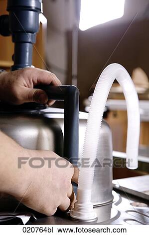 craftsman assembling kitchen sink View Large Photo Image Stock Image - craftsman assembling kitchen sink. Fotosearch