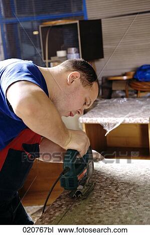 craftsman cutting wood with jigsaw View Large Photo Image Stock Image - craftsman cutting wood with jigsaw. Fotosearch