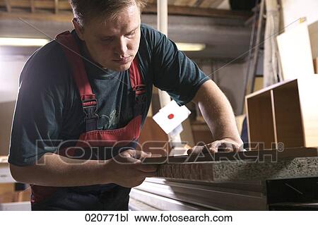 craftsmen assembling furniture in workshop View Large Photo Image Stock Image - craftsmen assembling furniture in workshop. Fotosearch