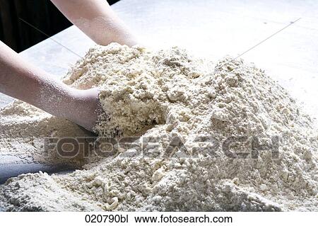 detail of baker mixing dough View Large Photo Image Stock Image - detail of baker mixing dough. Fotosearch