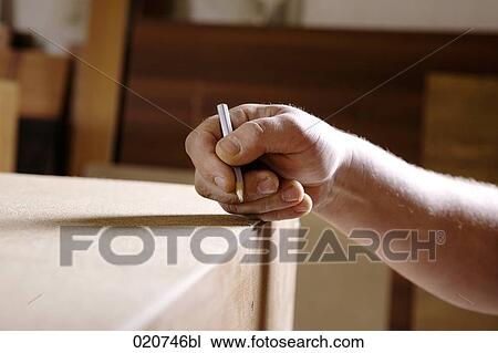 detail of craftsman making marking with pencil View Large Photo Image Stock Image - detail of craftsman making marking with pencil. Fotosearch