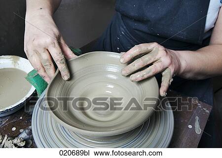 detail of potter forming jar on potter´s wheel View Large Photo Image Stock Image - detail of potter forming jar on potter´s wheel. Fotosearch