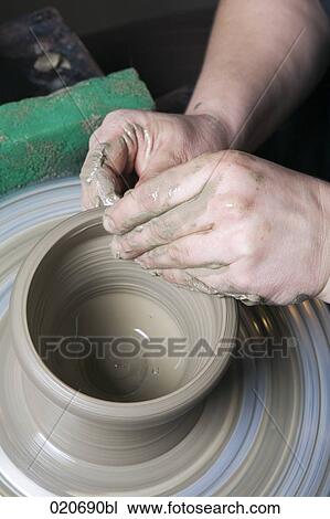 detail of potter forming jar on potter´s wheel View Large Photo Image Stock Image - detail of potter forming jar on potter´s wheel. Fotosearch