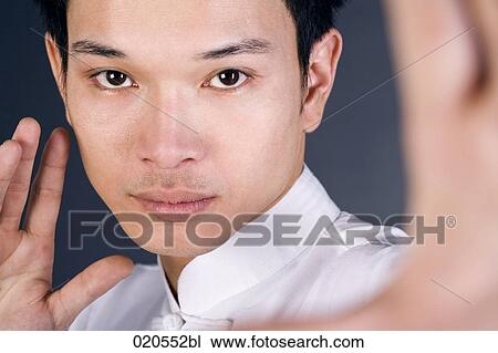 headshot of asian man doing martial arts View Large Photo Image Stock Image - headshot of asian man doing martial arts. Fotosearch