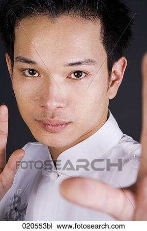 headshot of asian man doing martial arts View Large Photo Image Stock Image - headshot of asian man doing martial arts. Fotosearch
