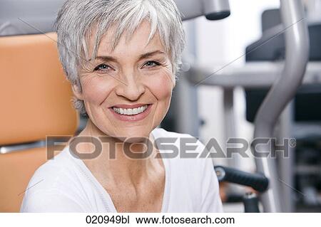 headshot of mature woman in gym View Large Photo Image Stock Image - headshot of mature woman in gym. Fotosearch