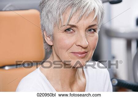 headshot of mature woman in gym View Large Photo Image Stock Image - headshot of mature woman in gym. Fotosearch