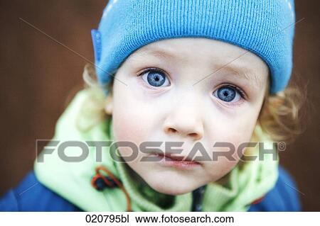 headshot of young boy looking at camera View Large Photo Image Stock Image - headshot of young boy looking at camera. Fotosearch
