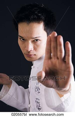 portrait of asian man doing martial arts View Large Photo Image Stock Image - portrait of asian man doing martial arts. Fotosearch