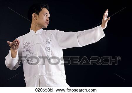 portrait of asian man doing martial arts View Large Photo Image Stock Image - portrait of asian man doing martial arts. Fotosearch