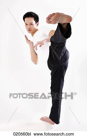portrait of asian man doing martial arts View Large Photo Image Stock Image - portrait of asian man doing martial arts. Fotosearch