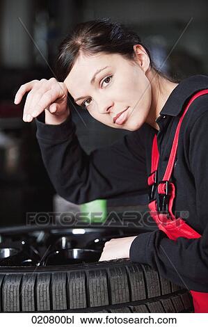 portrait of exhausted female mechanic View Large Photo Image Stock Image - portrait of exhausted female mechanic. Fotosearch