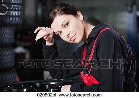 portrait of exhausted female mechanic View Large Photo Image Stock Image - portrait of exhausted female mechanic. Fotosearch