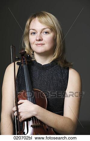 portrait of female violinist View Large Photo Image Stock Image - portrait of female violinist. Fotosearch