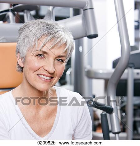 portrait of mature woman in gym View Large Photo Image Stock Image - portrait of mature woman in gym. Fotosearch