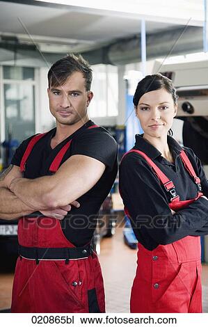 portrait of two mechanics in garage View Large Photo Image Stock Image - portrait of two mechanics in garage. Fotosearch