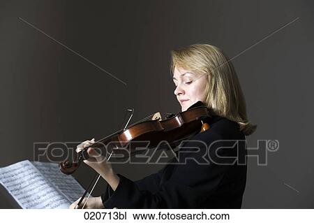 portrait of woman playing violin View Large Photo Image Stock Image - portrait of woman playing violin. Fotosearch