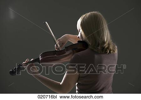 portrait of woman playing violin View Large Photo Image Stock Image - portrait of woman playing violin. Fotosearch