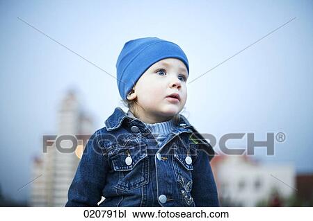 portrait of young boy outdoors View Large Photo Image Stock Image - portrait of young boy outdoors. Fotosearch