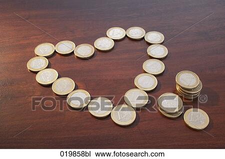 still life of euro coins forming heart View Large Photo Image Stock Image - still life of euro coins forming heart. Fotosearch