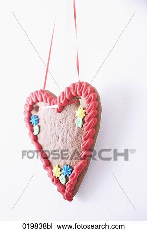 still life of gingerbread heart hanging on wall View Large Photo Image Stock Image - still life of gingerbread heart hanging on wall. Fotosearch