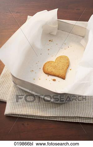 still life of heart shaped cookie in box View Large Photo Image Stock Image - still life of heart shaped cookie in box. Fotosearch