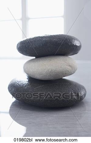 still life of pile of three stones View Large Photo Image Stock Image - still life of pile of three stones. Fotosearch