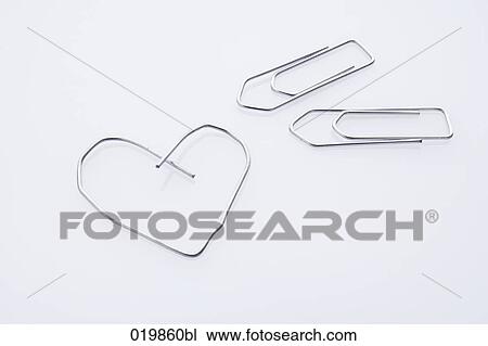 still life of three paper clips one in shape of heart View Large Photo Image Stock Image - still life of three paper clips one in shape of heart. Fotosearch