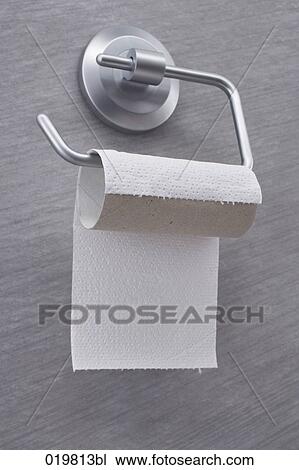 Stock Image - still life of toilet roll and holder. Fotosearch