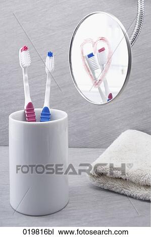 still life of toothbrushes and heart painted on mirror View Large Photo Image Stock Image - still life of toothbrushes and heart painted on mirror. Fotosearch